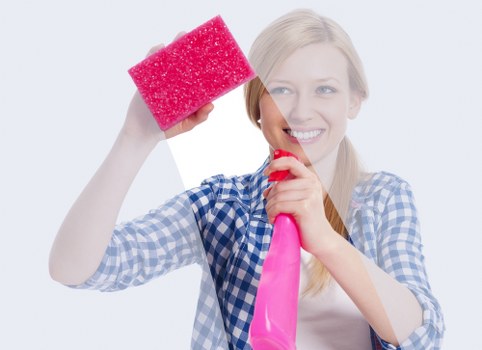 Local upholstery cleaner treating fabric chairs in South Kensington